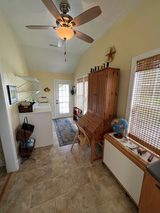 interior space featuring ceiling fan and vaulted ceiling