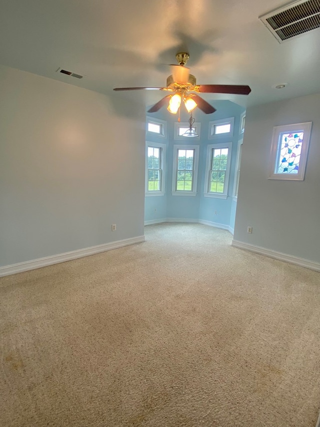 3150 Northumberland Hwy, Lottsburg, VA 22511 - unfurnished room with a ceiling fan and light colored carpet