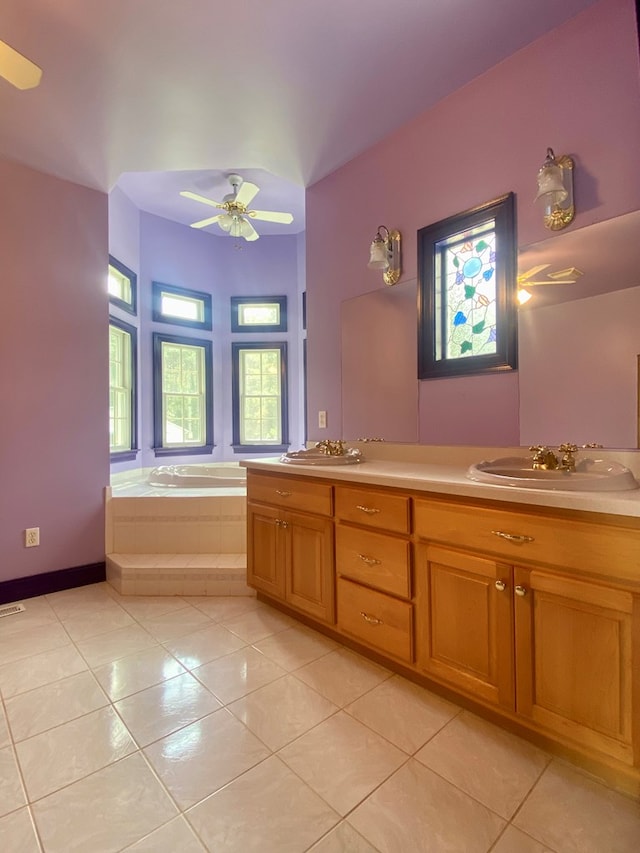 3150 Northumberland Hwy, Lottsburg, VA 22511 - full bath featuring tile patterned floors, double vanity, a bath, and ceiling fan