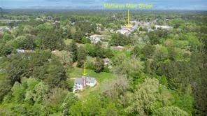 525 Main St, Mathews, VA 23109 - birds eye view of property featuring a view of trees