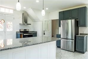 525 Main St, Mathews, VA 23109 - kitchen with wall chimney range hood, decorative light fixtures, stone counters, stainless steel appliances, and recessed lighting