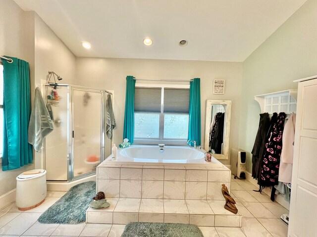 full bathroom featuring tile patterned floors, vanity, toilet, and shower / bath combo with shower curtain