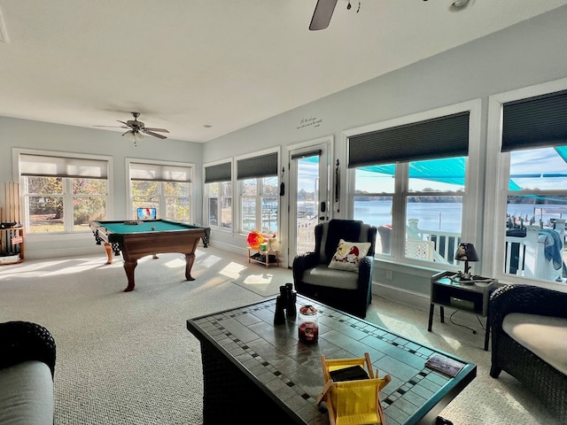 recreation room featuring carpet flooring, ceiling fan, a water view, and pool table