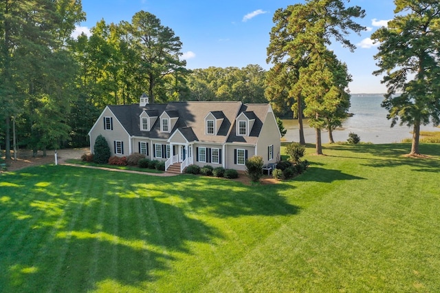 cape cod-style house featuring a water view and a front yard