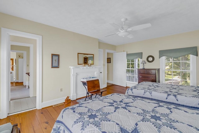118 Harvey Ln, Heathsville, VA 22473 - bedroom with wood-type flooring, baseboards, and ceiling fan