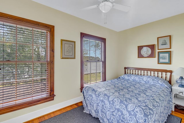 118 Harvey Ln, Heathsville, VA 22473 - bedroom with baseboards, wood finished floors, and ceiling fan