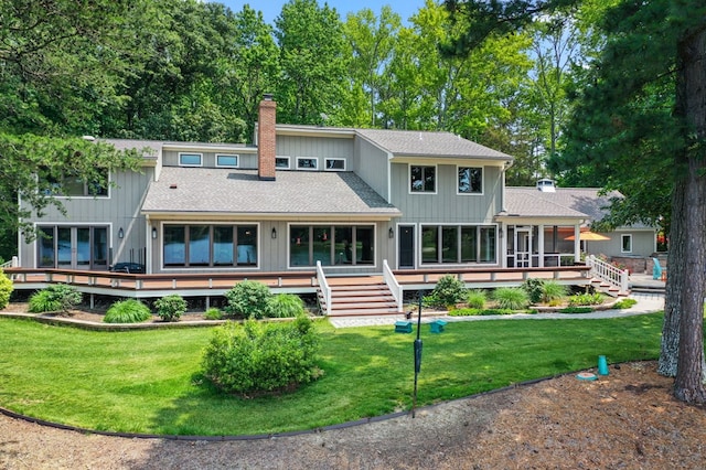 873 Deep Creek Rd, Lancaster, VA 22503 - back of house featuring a sunroom, stairs, a chimney, and a deck