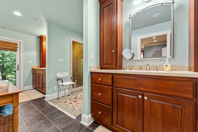 873 Deep Creek Rd, Lancaster, VA 22503 - full bath with vanity, a shower stall, baseboards, and tile patterned flooring