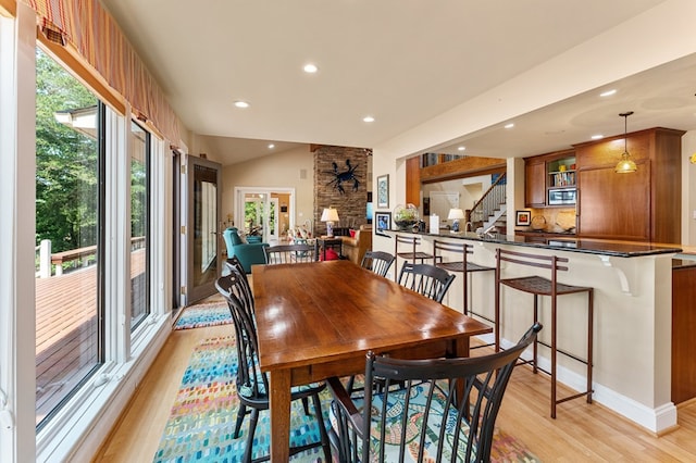 873 Deep Creek Rd, Lancaster, VA 22503 - dining area with light wood finished floors, stairs, recessed lighting, and lofted ceiling