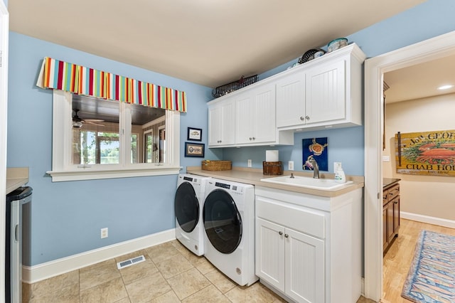 873 Deep Creek Rd, Lancaster, VA 22503 - laundry area featuring separate washer and dryer, cabinet space, baseboards, a ceiling fan, and wine cooler
