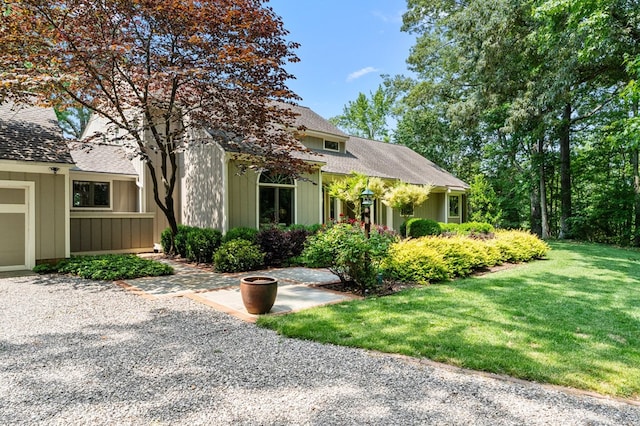 873 Deep Creek Rd, Lancaster, VA 22503 - view of front of property with a front lawn and a shingled roof