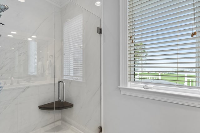 bathroom featuring an enclosed shower