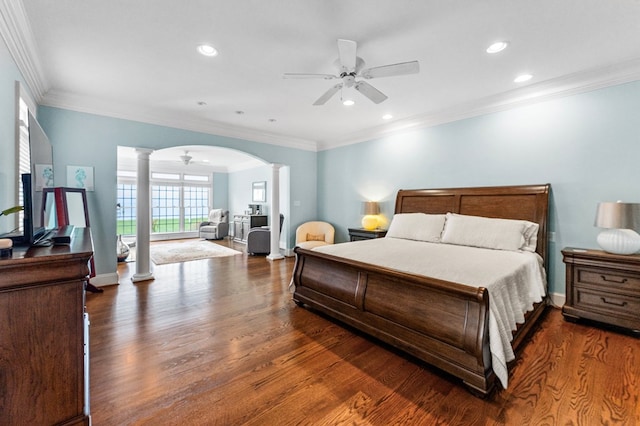 bedroom with ceiling fan, crown molding, and decorative columns