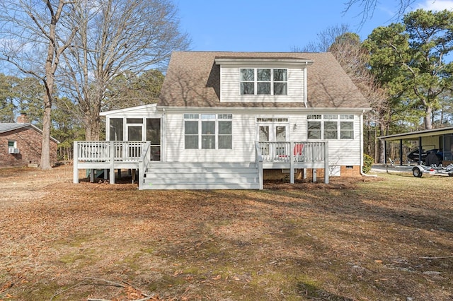 view of front facade featuring a sunroom, a shingled roof, a carport, crawl space, and a deck