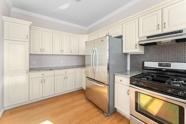 kitchen featuring light stone counters, ornamental molding, stainless steel appliances, under cabinet range hood, and light wood-type flooring