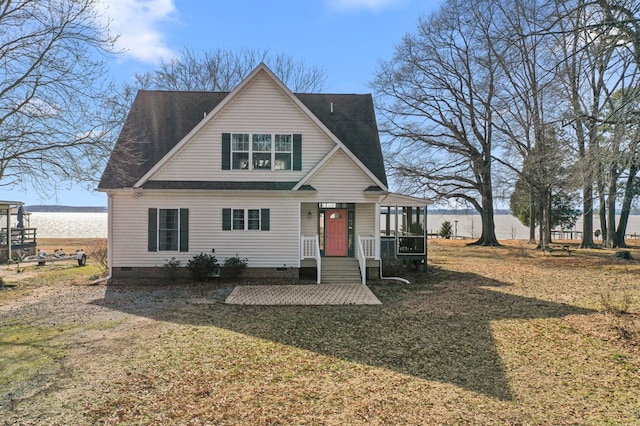 view of front of house with crawl space and a front lawn