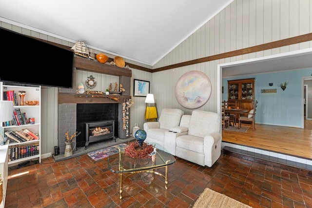 844 Monarch Shores Rd, Kilmarnock, VA 22482 - living room featuring lofted ceiling, a fireplace, and wooden walls