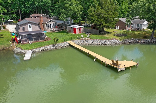 844 Monarch Shores Rd, Kilmarnock, VA 22482 - dock area featuring a water view, a yard, and a view of trees