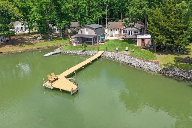 844 Monarch Shores Rd, Kilmarnock, VA 22482 - dock area with a water view and a yard