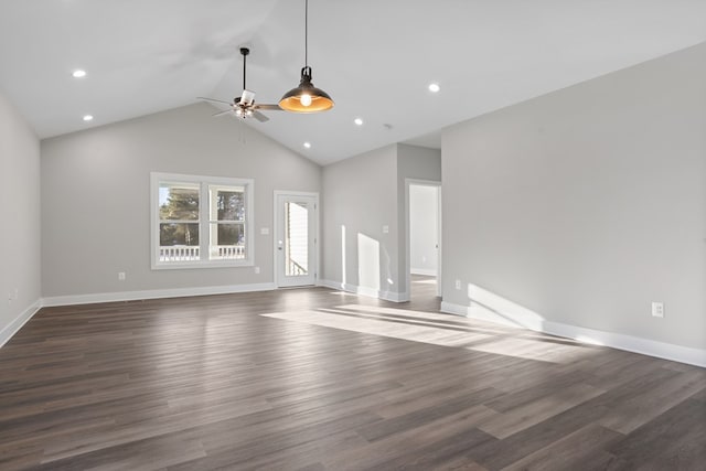 unfurnished living room featuring ceiling fan, dark hardwood / wood-style floors, and high vaulted ceiling