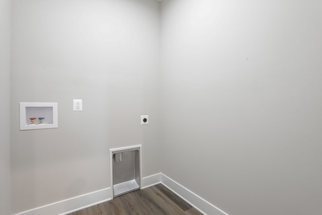 laundry room with washer hookup, dark wood-type flooring, and hookup for an electric dryer