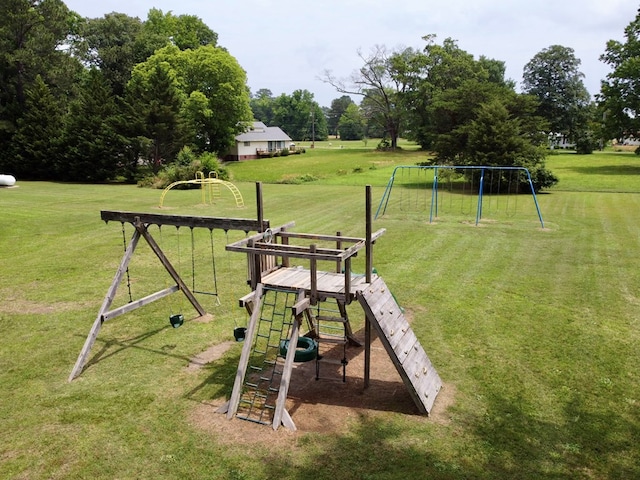 view of community with a playground and a lawn