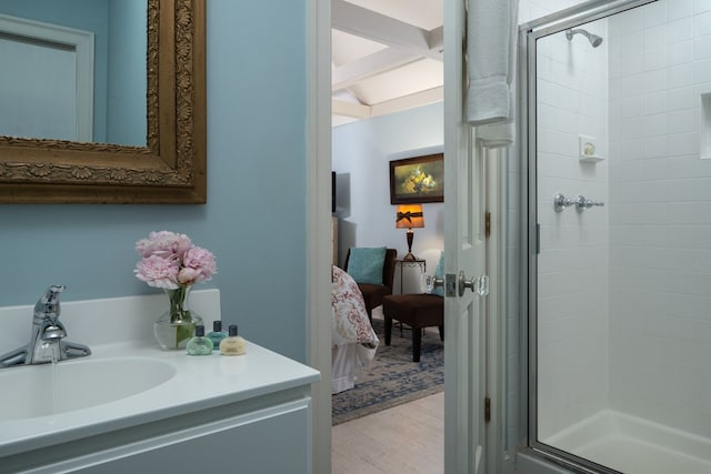 bathroom with vanity and an enclosed shower