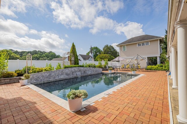 view of pool with a patio area