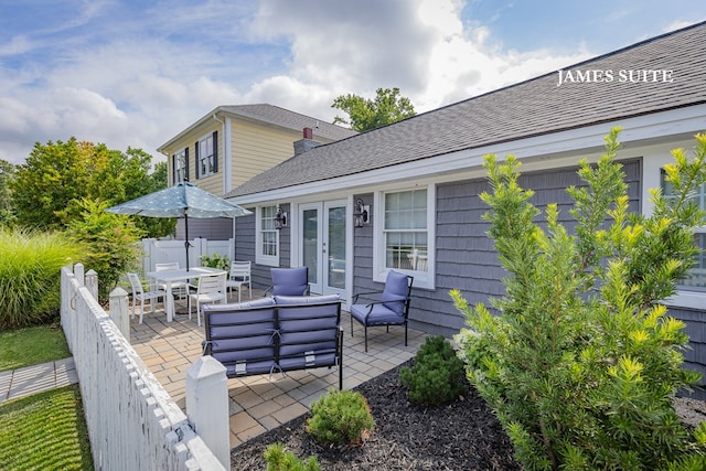 view of patio / terrace with an outdoor living space and french doors