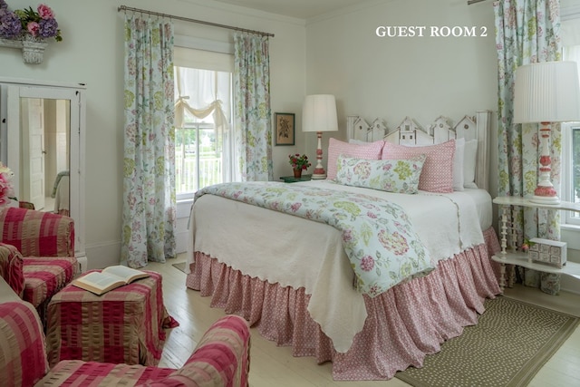 bedroom featuring crown molding