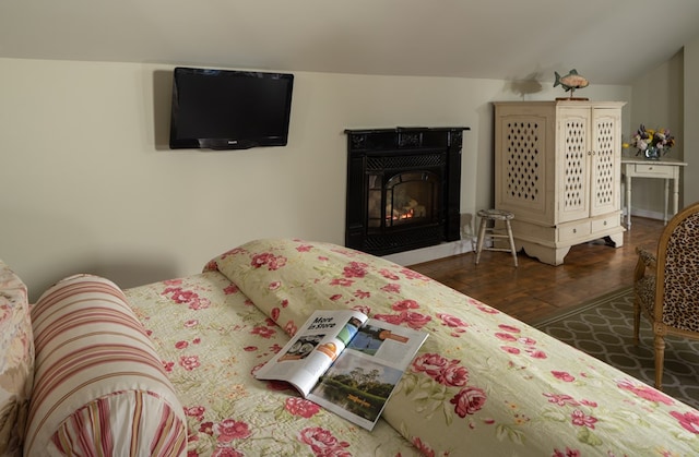 bedroom featuring dark hardwood / wood-style flooring