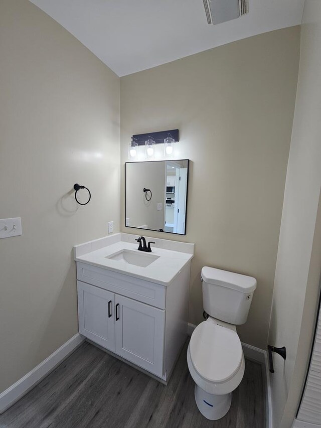 doorway to outside featuring a wealth of natural light and dark hardwood / wood-style floors