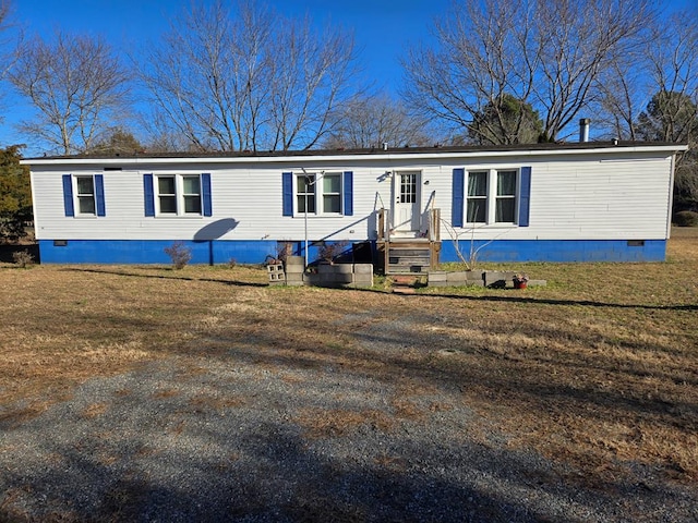 11012 River Rd, Mollusk, VA 22503 - manufactured / mobile home featuring a front lawn and crawl space
