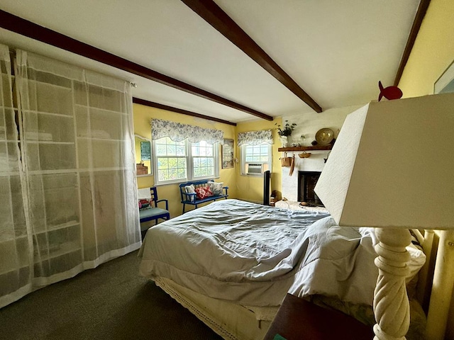 bedroom with dark carpet, cooling unit, a fireplace, and beam ceiling