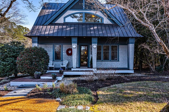 783 King Carter Dr, Irvington, VA 22480 - view of front of home with a porch