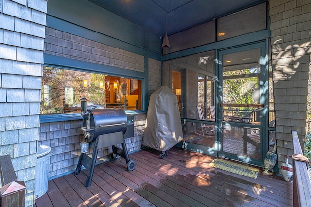 783 King Carter Dr, Irvington, VA 22480 - wooden deck with a grill