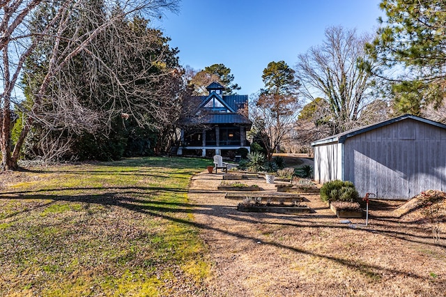 783 King Carter Dr, Irvington, VA 22480 - view of yard with an outdoor structure