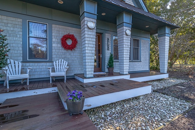 783 King Carter Dr, Irvington, VA 22480 - doorway to property featuring a porch
