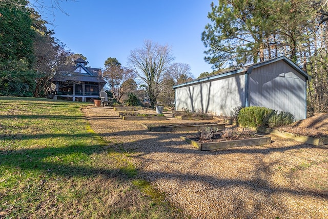 783 King Carter Dr, Irvington, VA 22480 - view of yard featuring an outdoor structure
