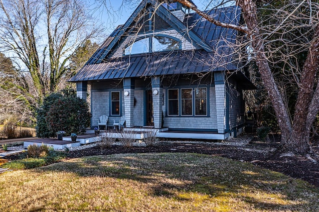 783 King Carter Dr, Irvington, VA 22480 - view of front of house featuring a front yard and covered porch