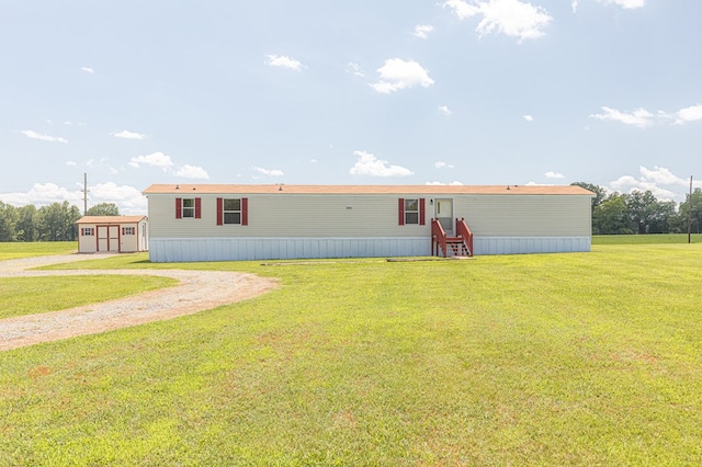 640 Ridge Rd, Callao, VA 22435 - manufactured / mobile home featuring a front lawn, a storage shed, and driveway