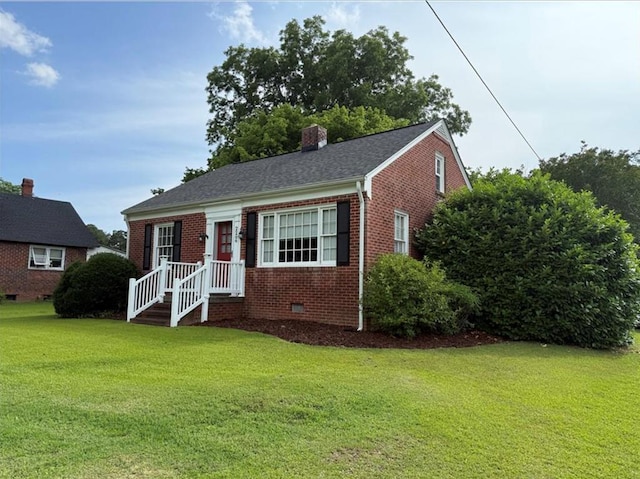 2266 Hayes Rd, Hayes, VA 23072 - bungalow-style house featuring brick siding, a front lawn, crawl space, and a chimney