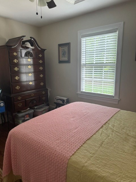 2266 Hayes Rd, Hayes, VA 23072 - bedroom with a ceiling fan and wood finished floors
