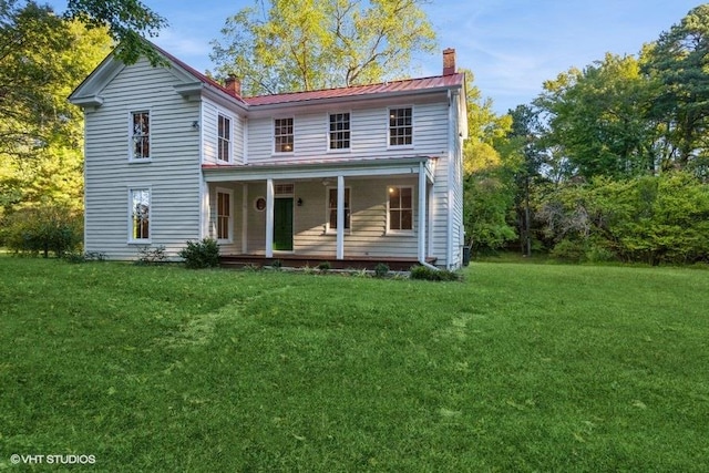 view of front of home with a front lawn