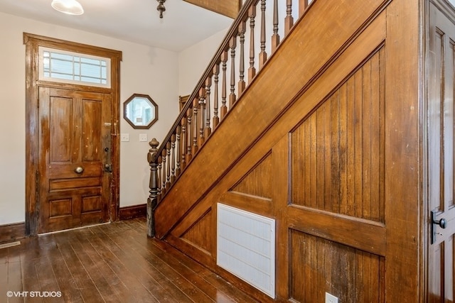 foyer with dark wood-type flooring