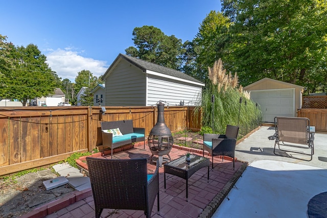 view of patio featuring an outdoor living space and an outdoor structure