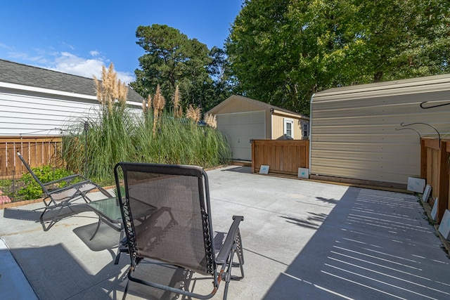 view of patio / terrace featuring an outbuilding