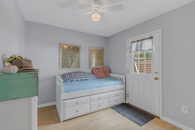 bedroom featuring light hardwood / wood-style flooring and ceiling fan