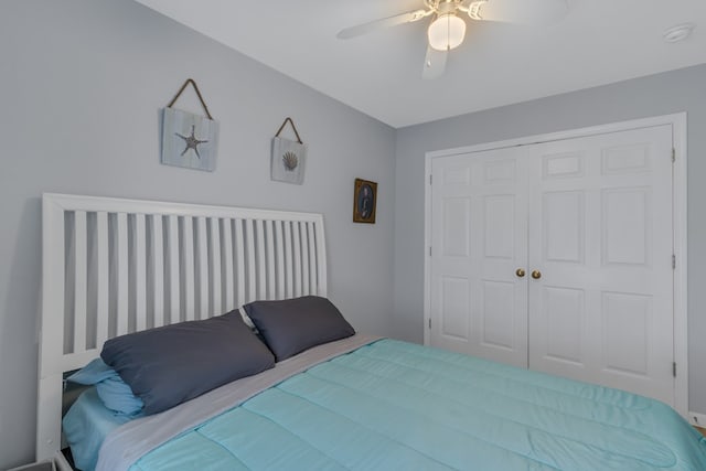 bedroom with a closet and ceiling fan