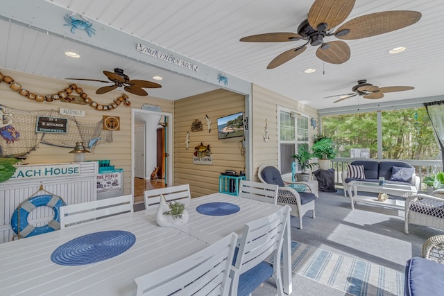 exterior space featuring an outdoor living space and ceiling fan